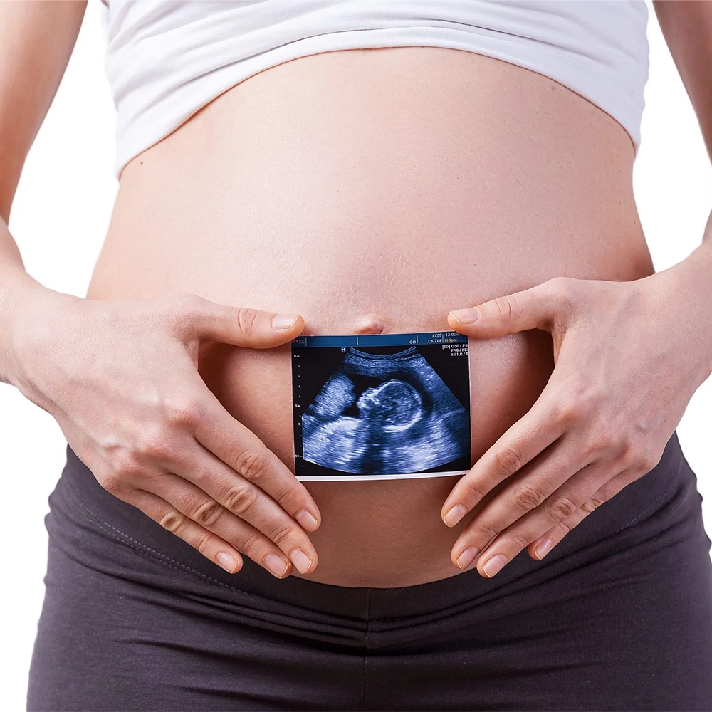 Ultraschall über schwangerem Bauch